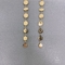 Длинное ожерелье и серьги Magic Symbol из 14-каратного золота поверх ювелирных изделий из нержавеющей стали